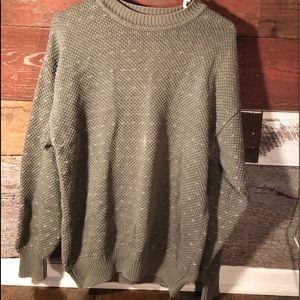 green sweater with white detailing,great condition
